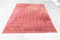 Lot 1782 - Large Bokhara-style carpet - the brick-red...