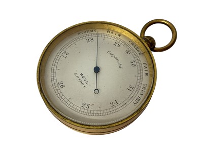 Lot 742 - Late Victorian pocket barometer by Ross, London in gilt brass circular case in original leather case