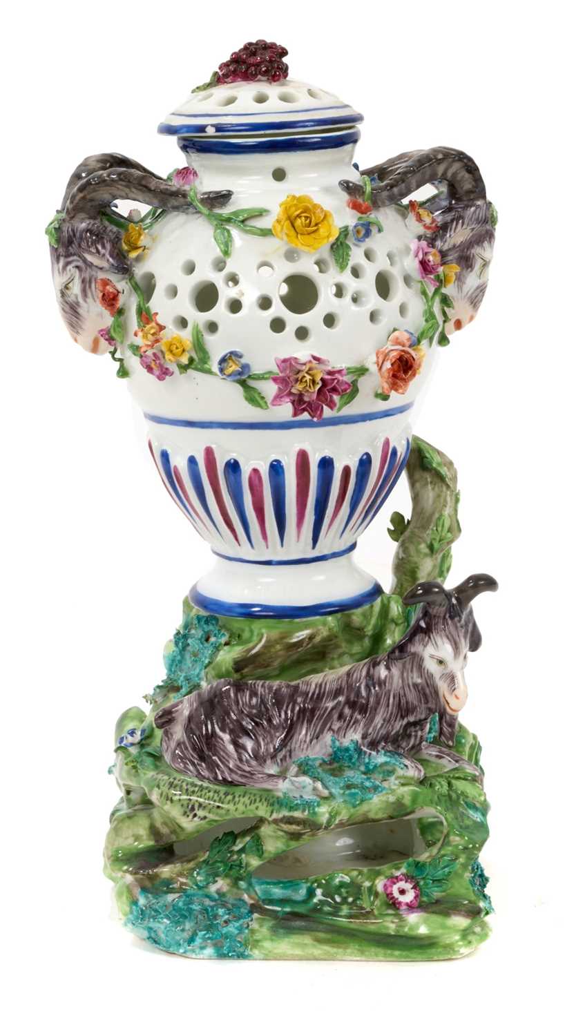 Lot 60 - Continental porcelain pot pourri vase and cover, modelled with a goat