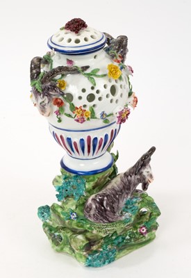 Lot 60 - Continental porcelain pot pourri vase and cover, modelled with a goat