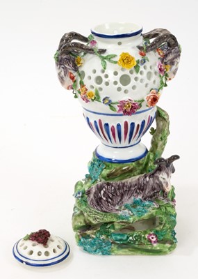 Lot 60 - Continental porcelain pot pourri vase and cover, modelled with a goat