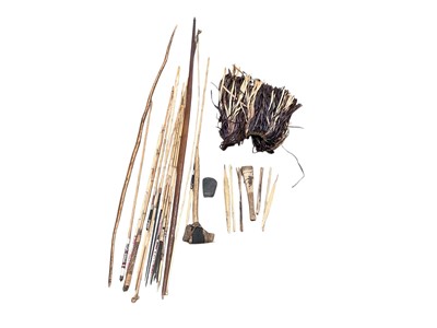 Lot 2467 - Two tribal bows with selection of arrows etc
