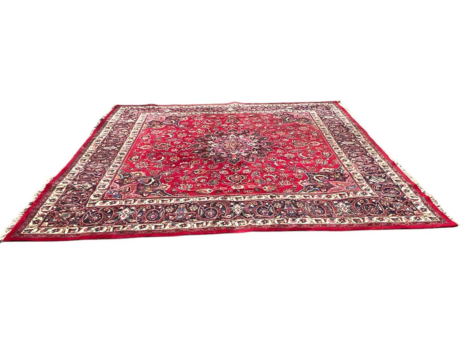 Lot 1582 - Large Iranian carpet of heavy pile with central foliate medallion