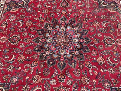 Lot 1582 - Large Iranian carpet of heavy pile with central foliate medallion