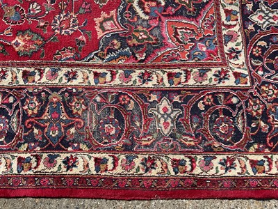 Lot 1582 - Large Iranian carpet of heavy pile with central foliate medallion