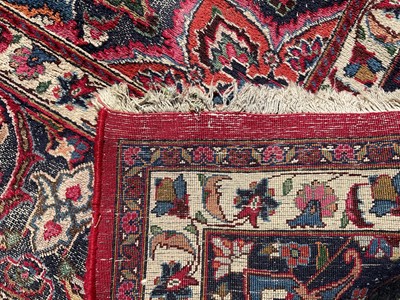 Lot 1582 - Large Iranian carpet of heavy pile with central foliate medallion