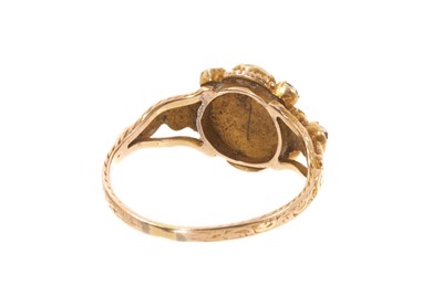 Lot 485 - Early Victorian ruby, emerald and pearl cluster ring in gold setting with pierced scroll shoulders on engraved gold shank, in a Victorian ring box. Ring size O.