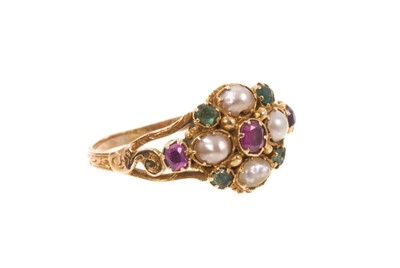 Lot 485 - Early Victorian ruby, emerald and pearl cluster ring in gold setting with pierced scroll shoulders on engraved gold shank, in a Victorian ring box. Ring size O.