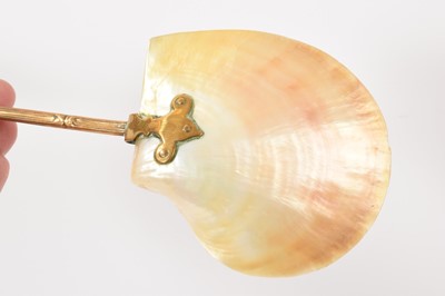 Lot 780 - 19th century brass and mother of pearl caviar serving spoon
