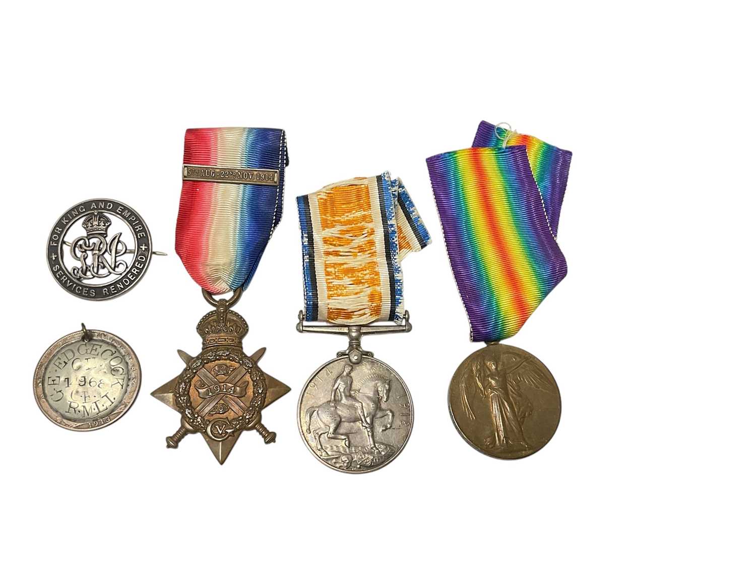 Lot 59 - First World War trio comprising 1914 'Mons' Star with 5th Aug. - 22nd. Nov. 1914 clasp named to CH. 14968 PTE. G. E. Edgecock. R. M. Brigade., War and Victory medals