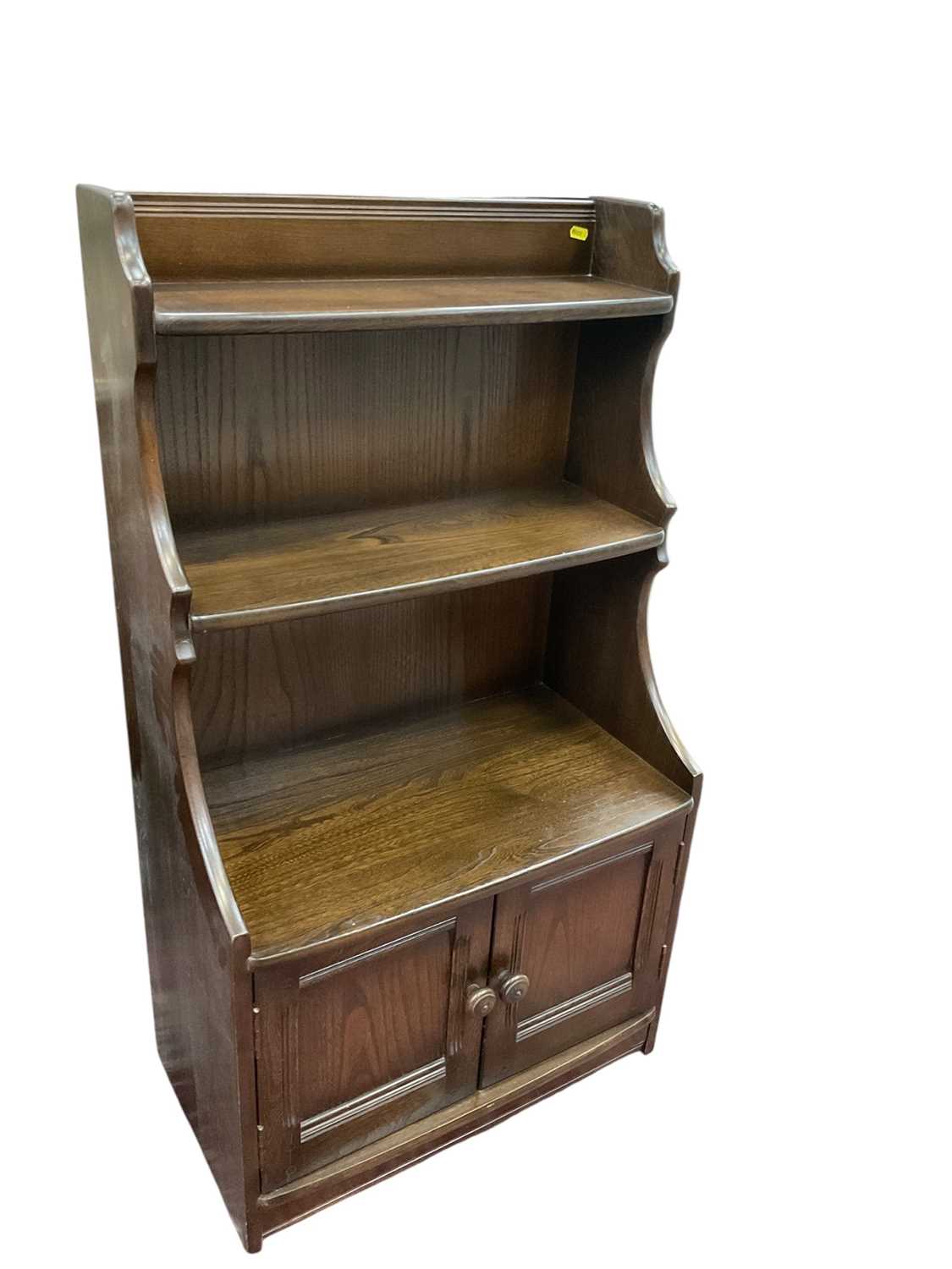 Lot 1290 - Ercol waterfall bookcase