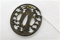 Lot 864 - Fine 18th century Japanese iron tsuba with...