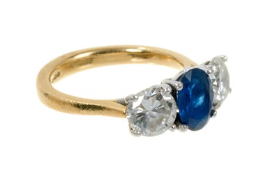 Lot 496 - Diamond and sapphire three stone ring