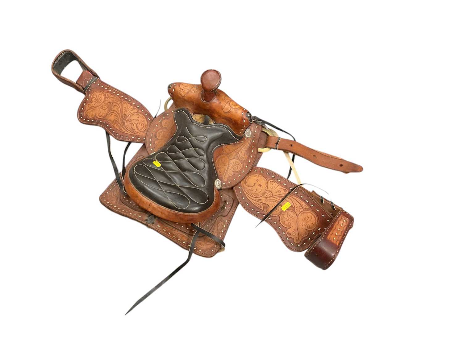 Lot 567 - Child's American leather saddle