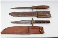 Lot 873 - Second World War fighting knife with...