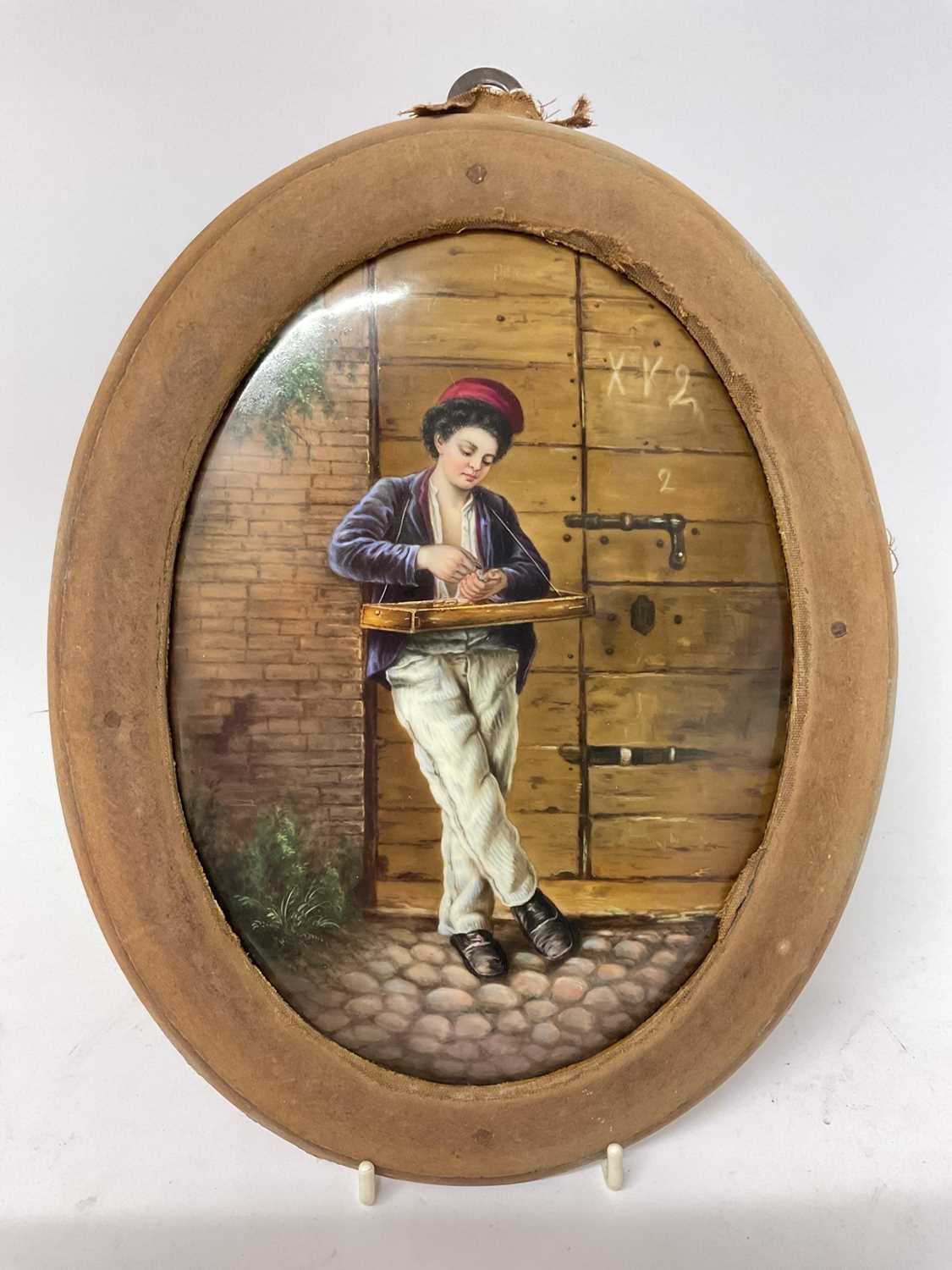 Lot 12 - 19th century continental hand painted porcelain plaque 'Italian boy, my first days business'