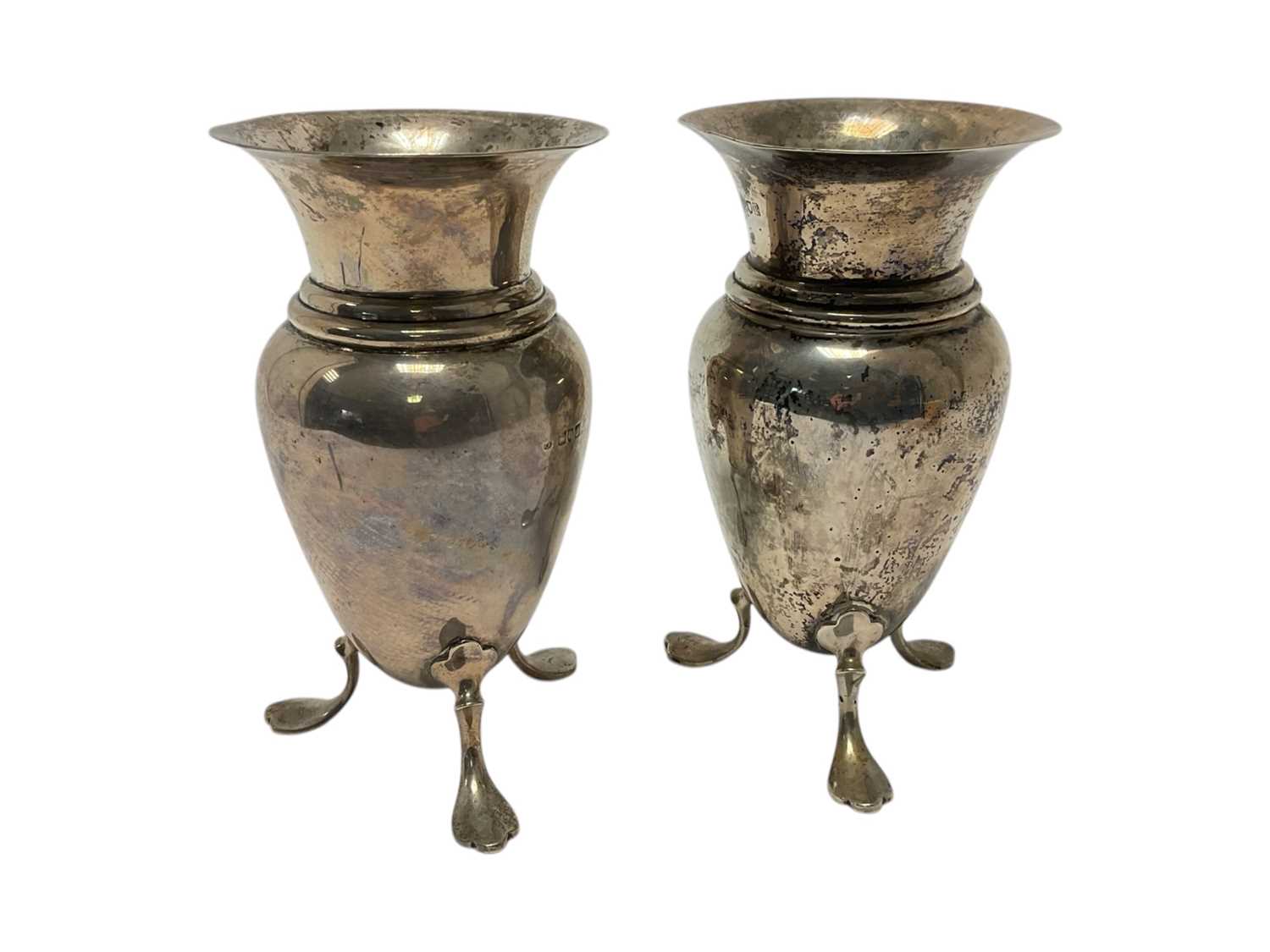 Lot 262 - Pair Victorian silver vases raised on three splayed feet