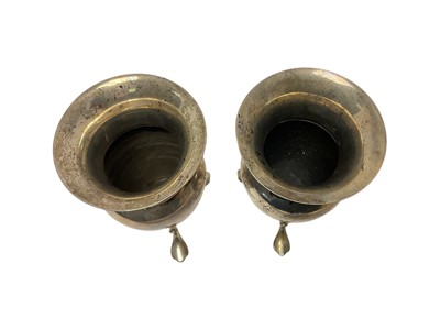 Lot 262 - Pair Victorian silver vases raised on three splayed feet