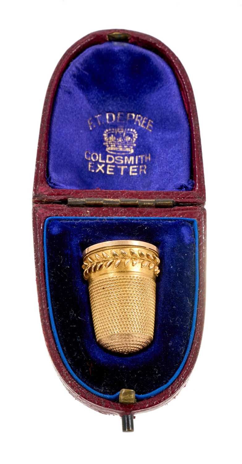 Lot 474 - Victorian gold/yellow metal thimble in original leather case