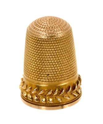 Lot 474 - Victorian gold/yellow metal thimble in original leather case
