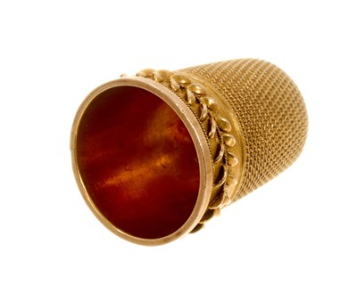 Lot 474 - Victorian gold/yellow metal thimble in original leather case