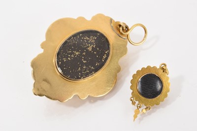Lot 480 - Two Victorian cabochon garnet pendants