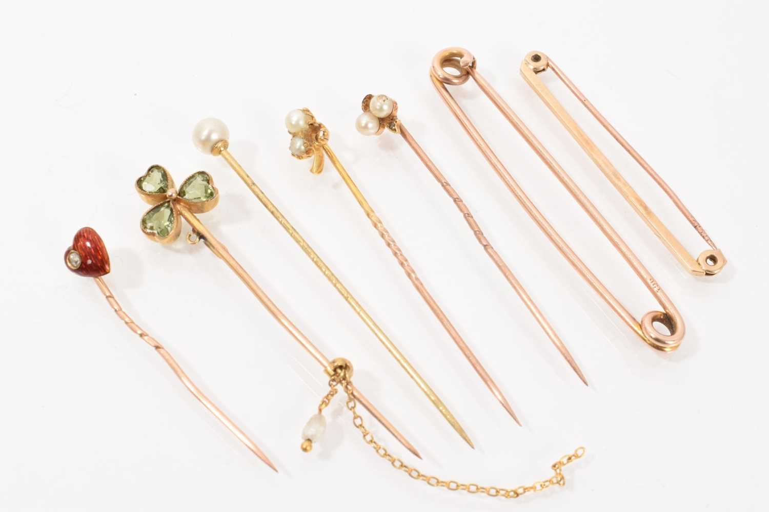 Lot 481 - Group of five antique stick pins plus two gold tie pins (7)