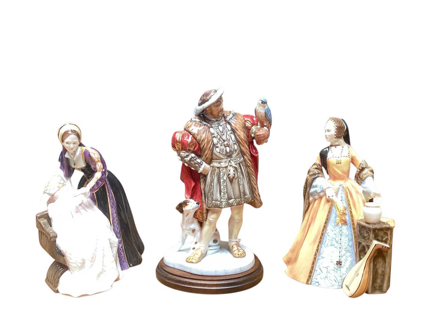Lot 912 - Set of seven Royal Doulton limited edition figures - Henry VIII and his six wives