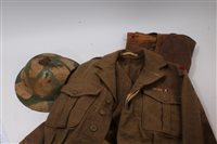 Lot 704 - Second World War brown leather jerkin dated...