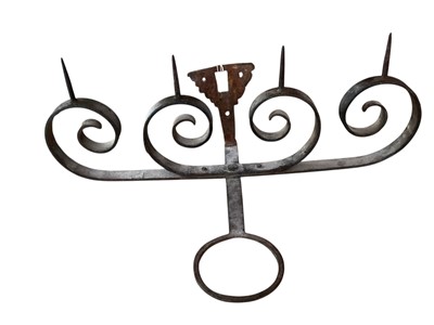 Lot 2616 - Antique iron wall mounted pricket candelabra with scroll decoration.