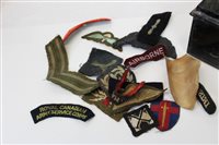 Lot 711 - One box of Second World War cloth military...