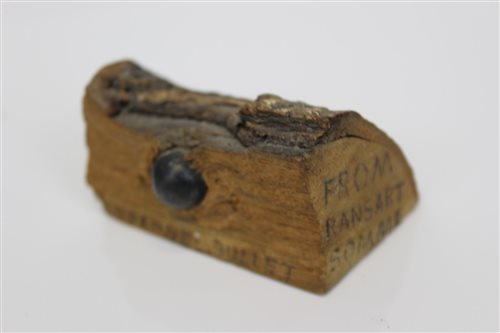 Lot 718 - First World War shrapnel bullet embedded in...