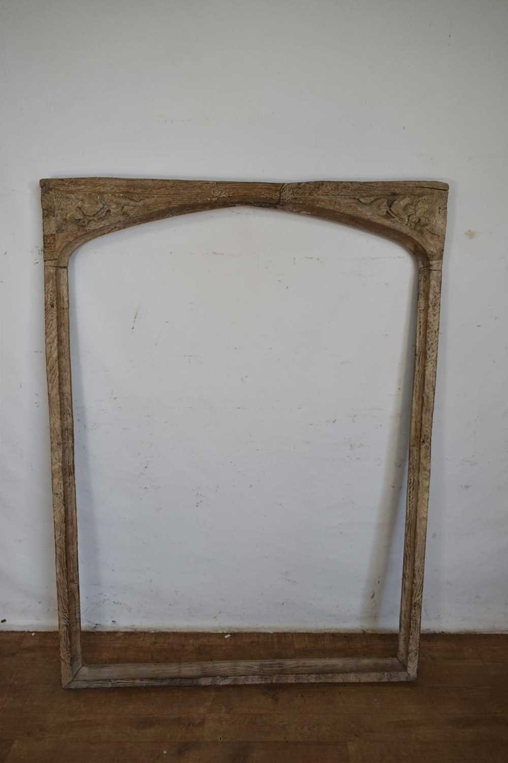 Lot 1517 - Tudor period carved oak window frame