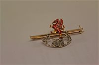 Lot 723 - Yellow metal and enamel Royal Welsh Fusiliers...