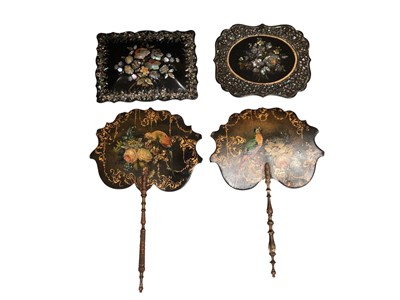 Lot 783 - Pair Victorian papier mâché fans each painted with a parrot and flowers, gilt borders, together with two other papier mache panels (4)