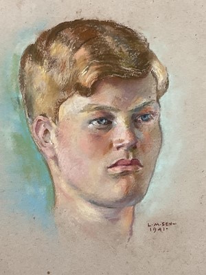 Lot 115 - Lalit Mohan Sen (Indian, 1898-1954) pastel portrait of a young man, signed and dated 1941, 63cm x 47cm, in glazed frame