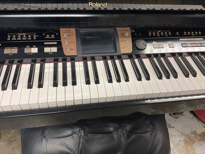 Lot 258 - Roland MR-15 Intelligent mini-grand digital piano