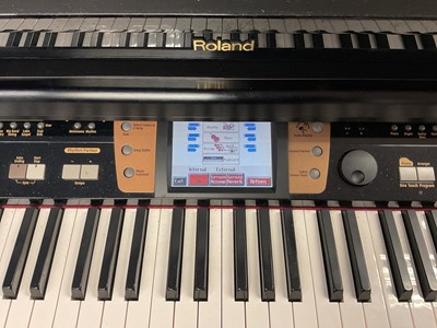 Lot 258 - Roland MR-15 Intelligent mini-grand digital piano