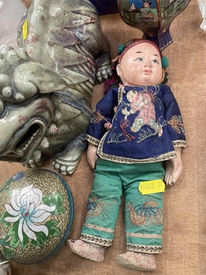 Lot 594 - Chinese ceramic celadon dog of foo, Chinese small doll with embroidered clothes, Chinese small teapot, a cloisonné small vase, two dishes and other oriental items.