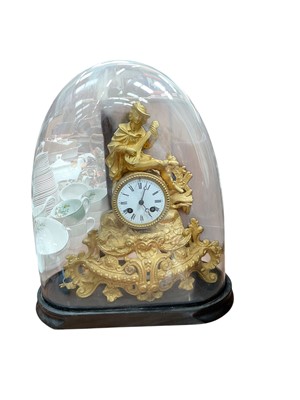 Lot 518 - 19th century ormolu mantel clock under a glass dome.