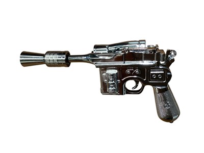 Lot 15 - Star Wars Master Replica Episode IV: A New Hope small scaled Stormtrooper Blaster & Episode V:The Empire Strikes Back Han Solo Blaster, both in display cases