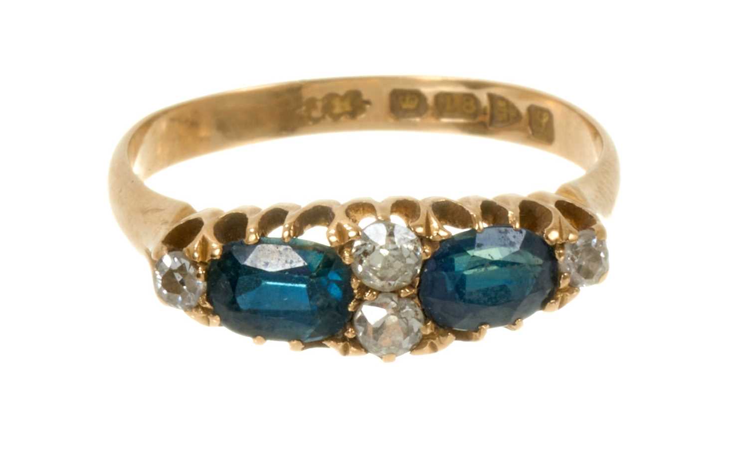 Lot 606 - Edwardian sapphire and diamond ring with two