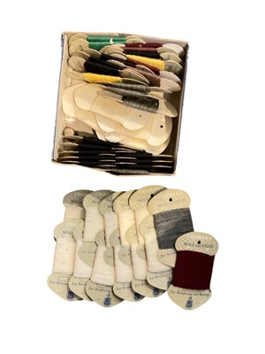 Lot 696 - Group of fabric trims ranging in different patterns and colours, together with a box of thread.