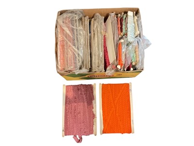 Lot 696 - Group of fabric trims ranging in different patterns and colours, together with a box of thread.