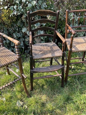 Lot 1459 - Three 19th century rustic ash and elm children's high chairs, the tallest 94.5cm high