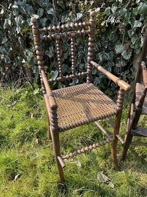 Lot 1459 - Three 19th century rustic ash and elm children's high chairs, the tallest 94.5cm high