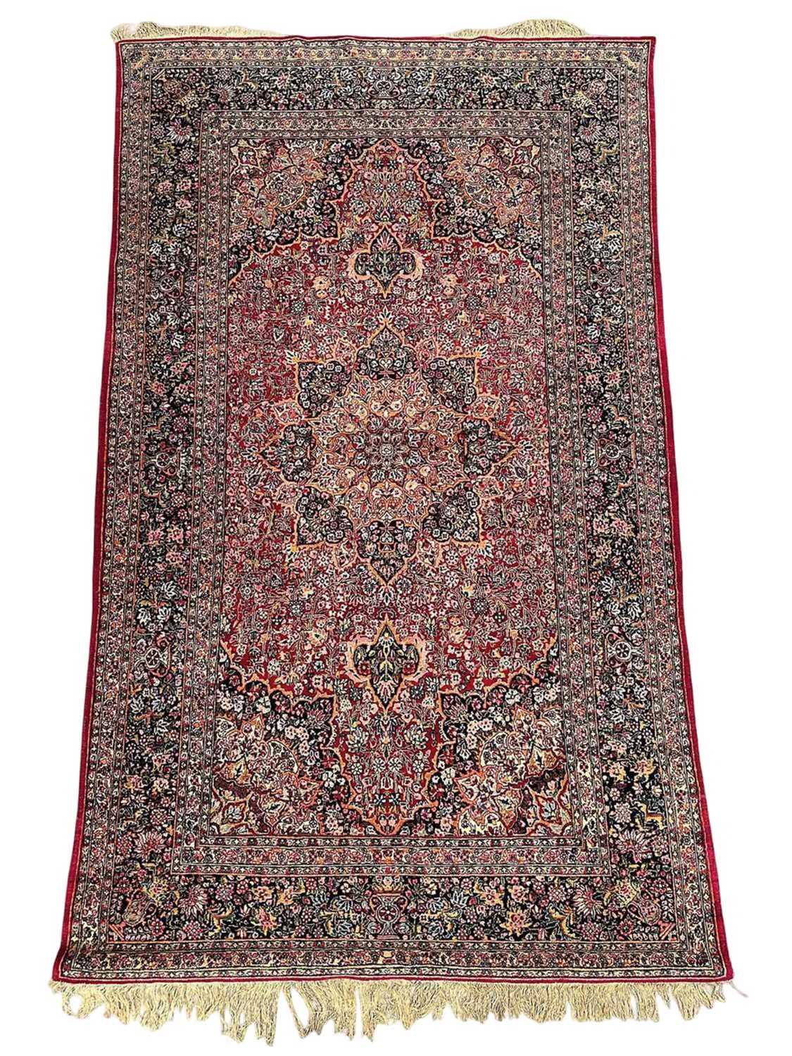 Lot 1479 - Fine Kashan part silk rug