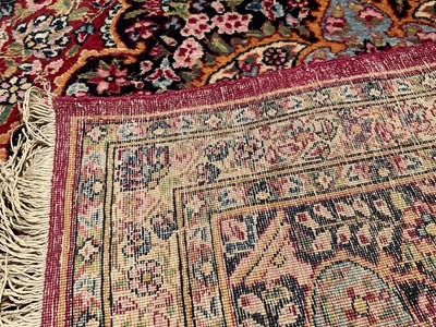 Lot 1479 - Fine Kashan part silk rug