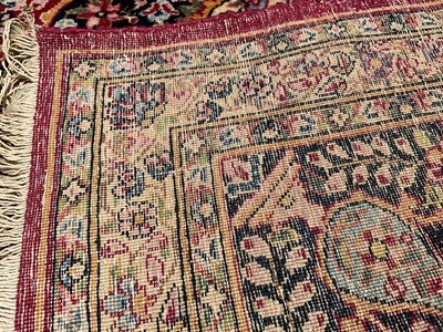 Lot 1479 - Fine Kashan part silk rug