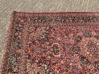 Lot 1479 - Fine Kashan part silk rug